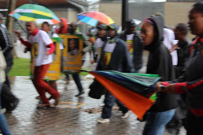 People entering FNB Stadium, where the memorial was held